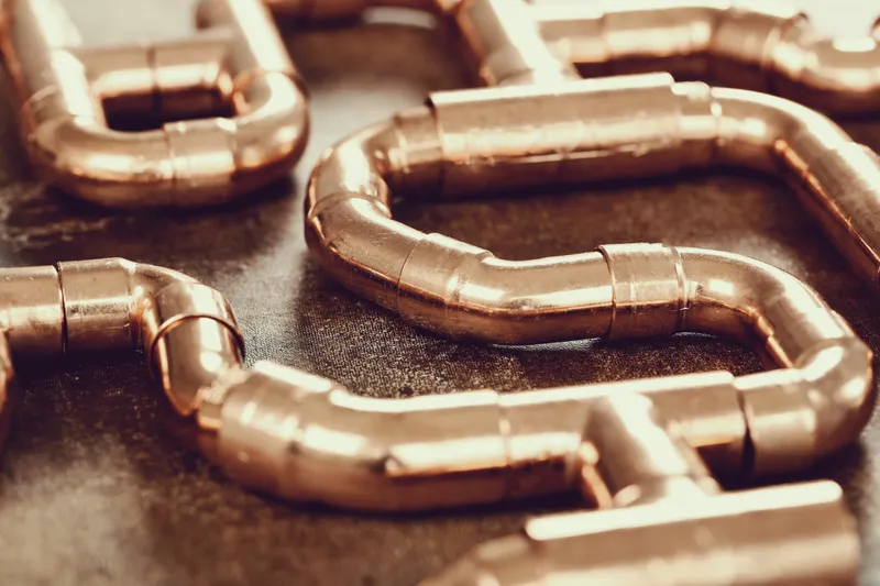 Professional copper piping installation for bathroom plumbing systems